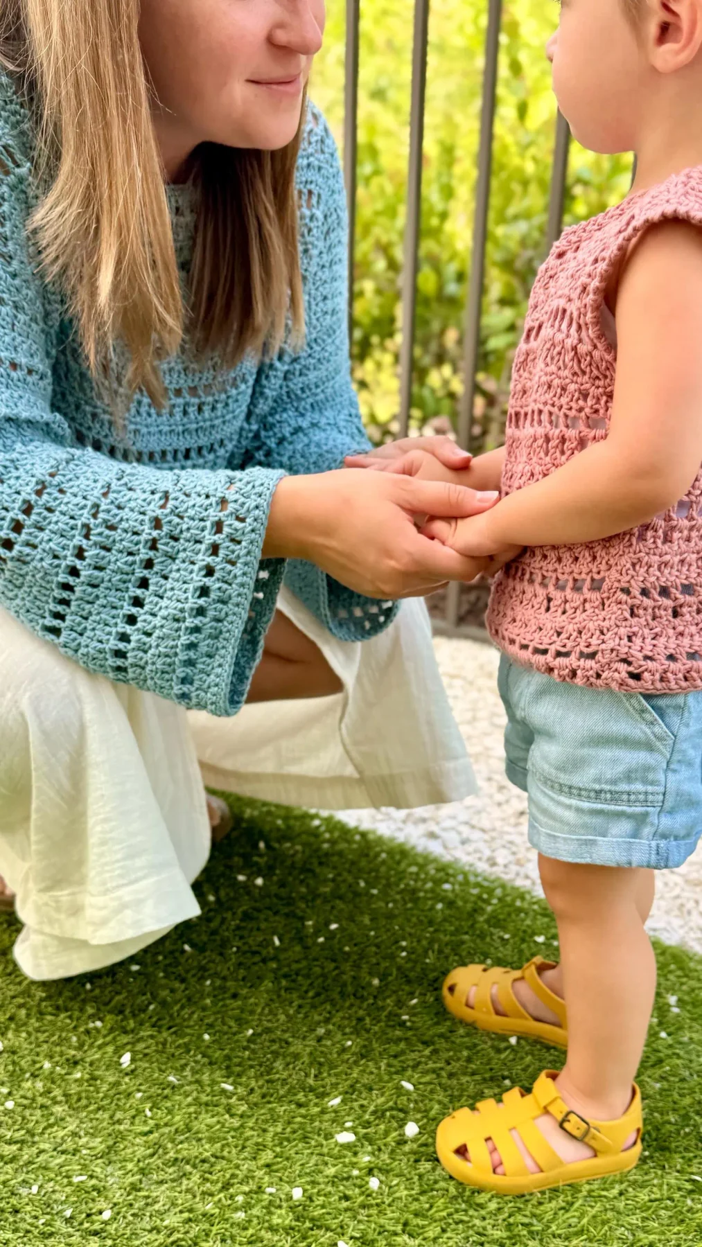 Blue adult and pink kids' Saltwater Drift tops worn together